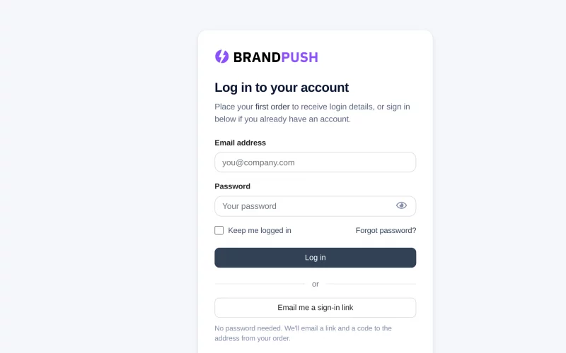The BrandPush login page with email and password fields, a show-password button and a Forgot password link