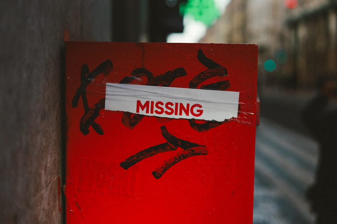 a close up of a sign on a pole