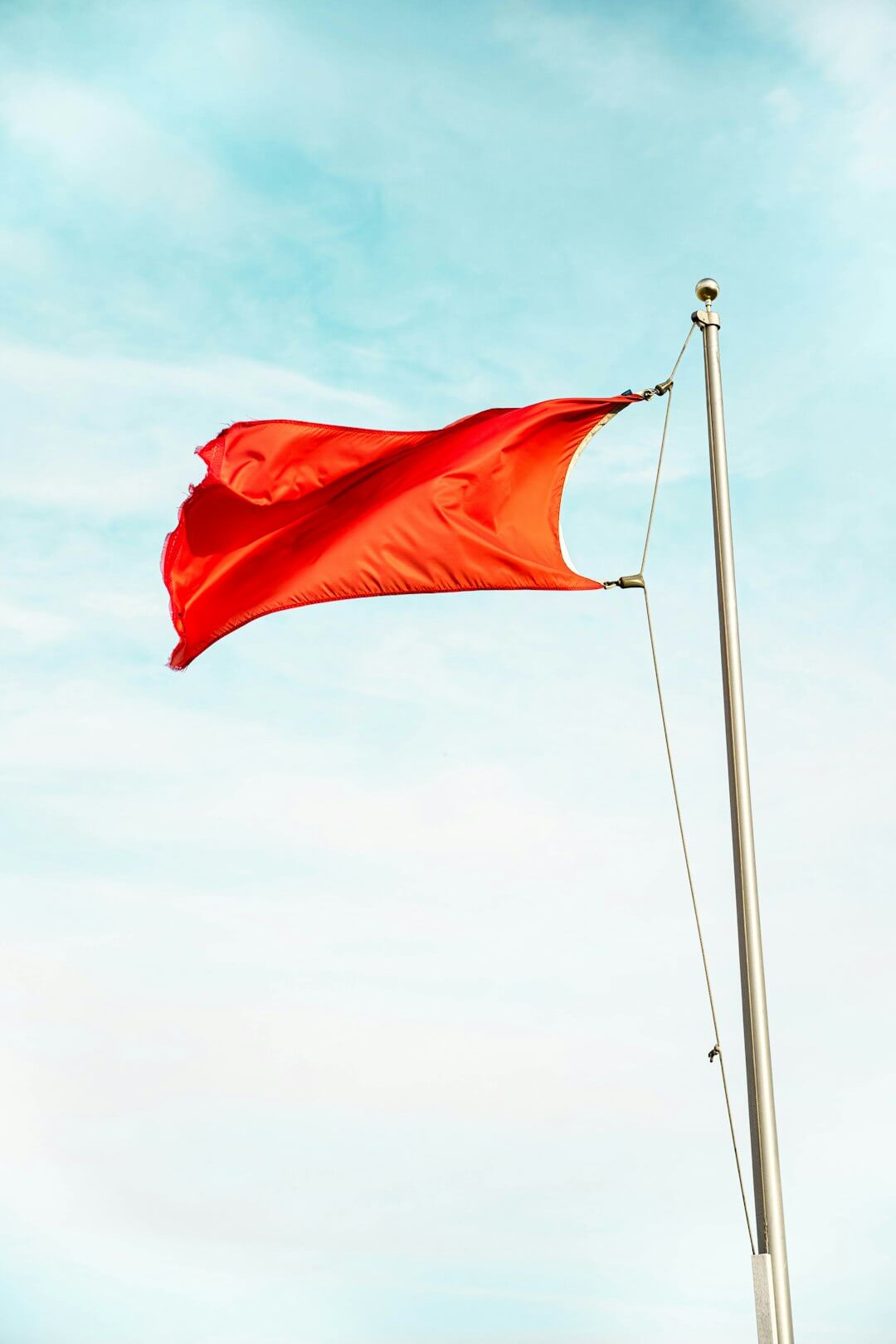 red and gray metal stand