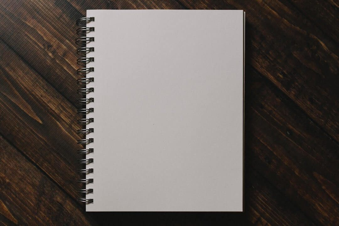A black notebook with "notes" written on it.