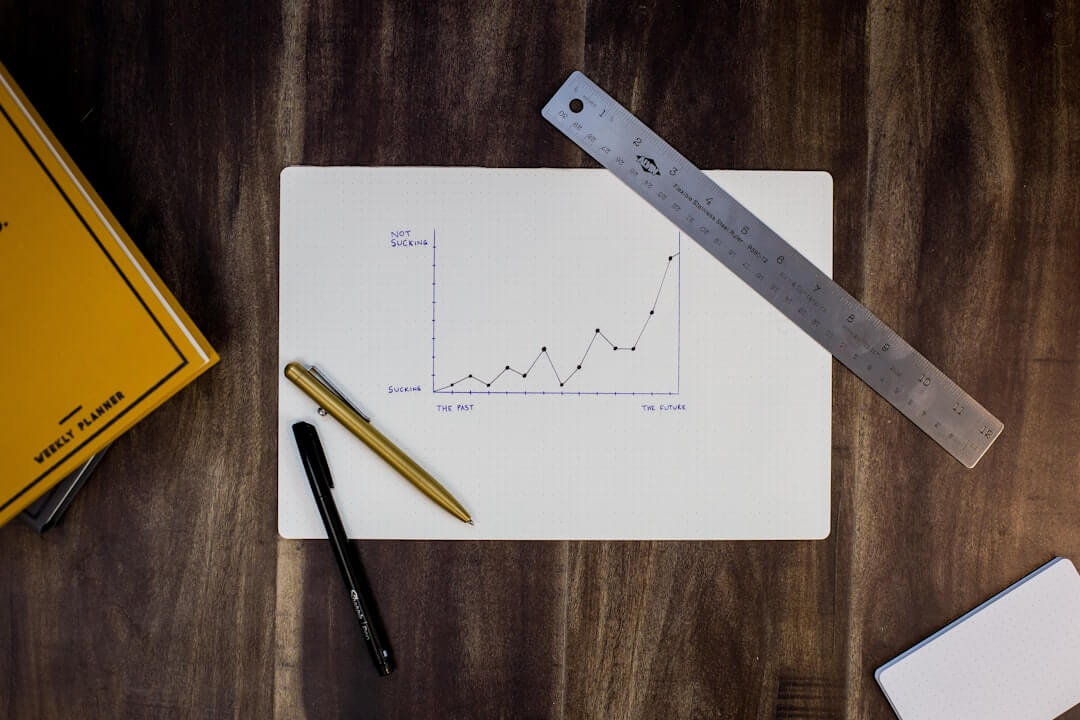 financial newspaper with stock chart