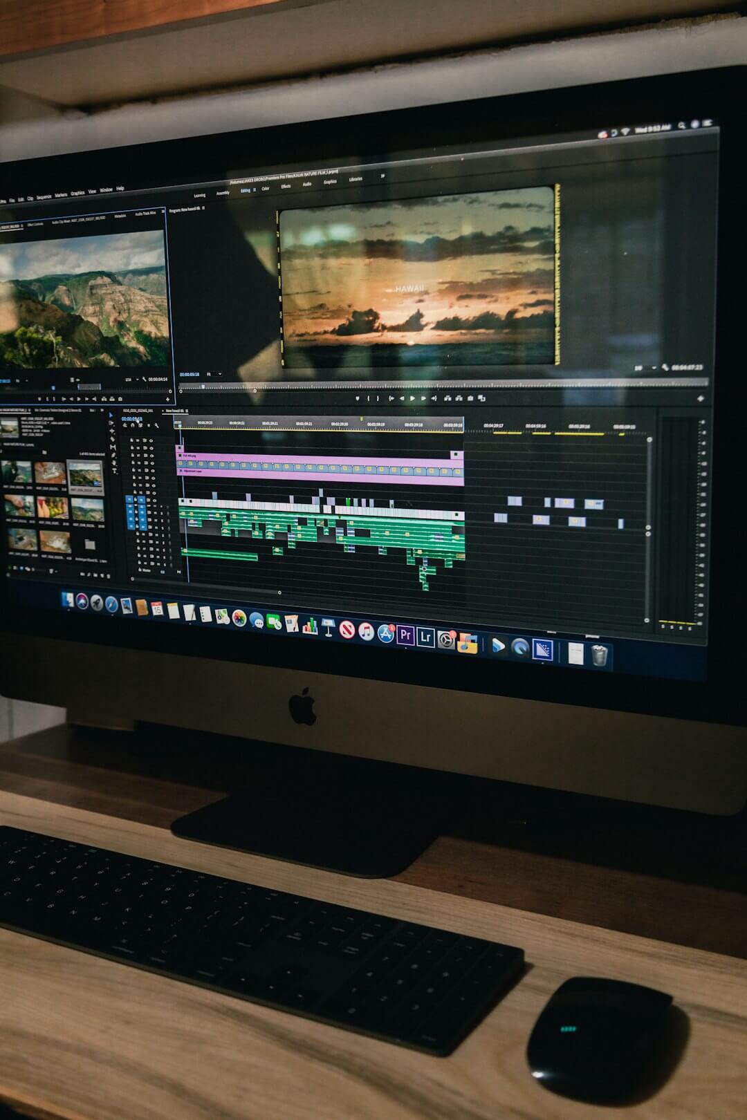 A man edits video on a computer.
