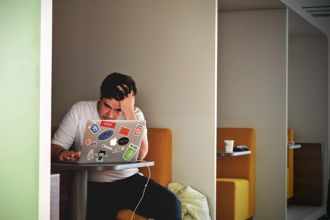 a man with a laptop