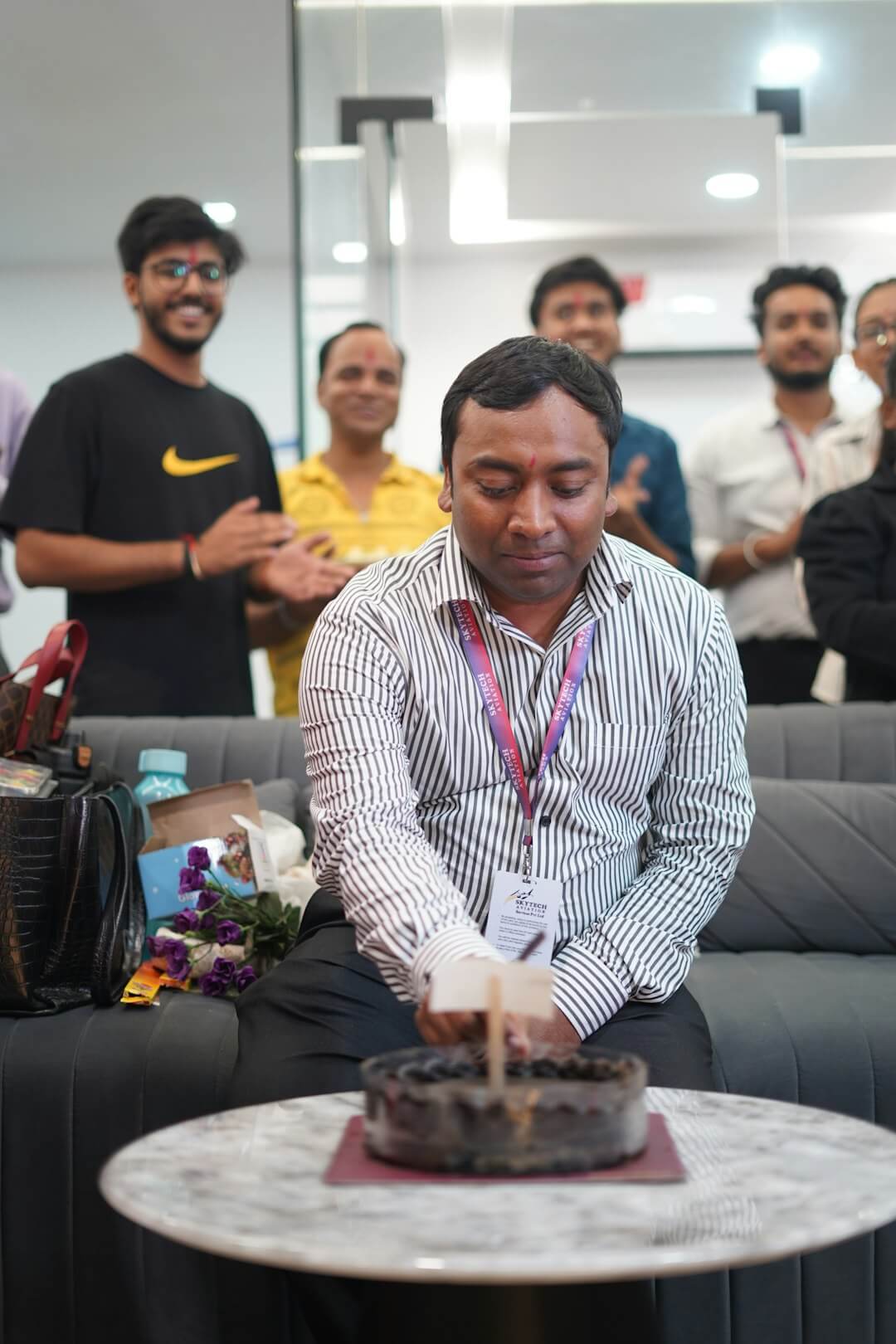 Man gives cadbury chocolates box to woman