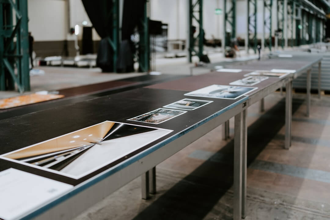 a wooden table topped with lots of different types of items