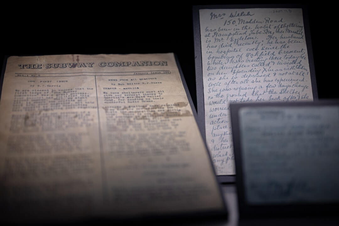 Papers and documents scattered on the floor.
