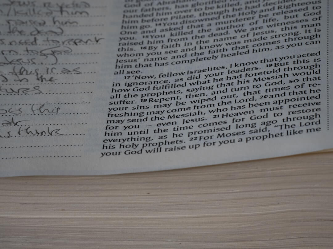 A close up of a book with writing on it