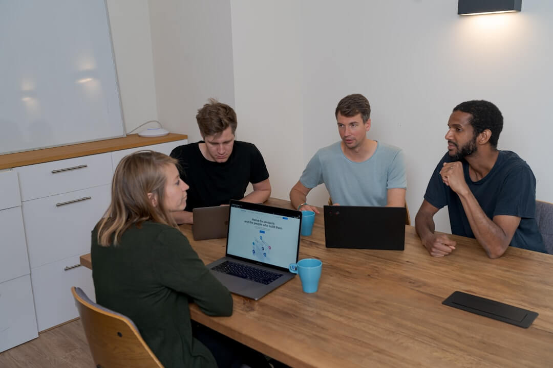a group of people standing in a room