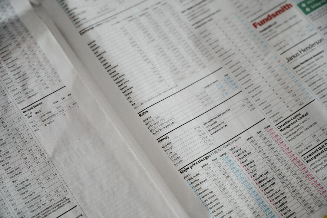 Someone is calculating their finances with documents