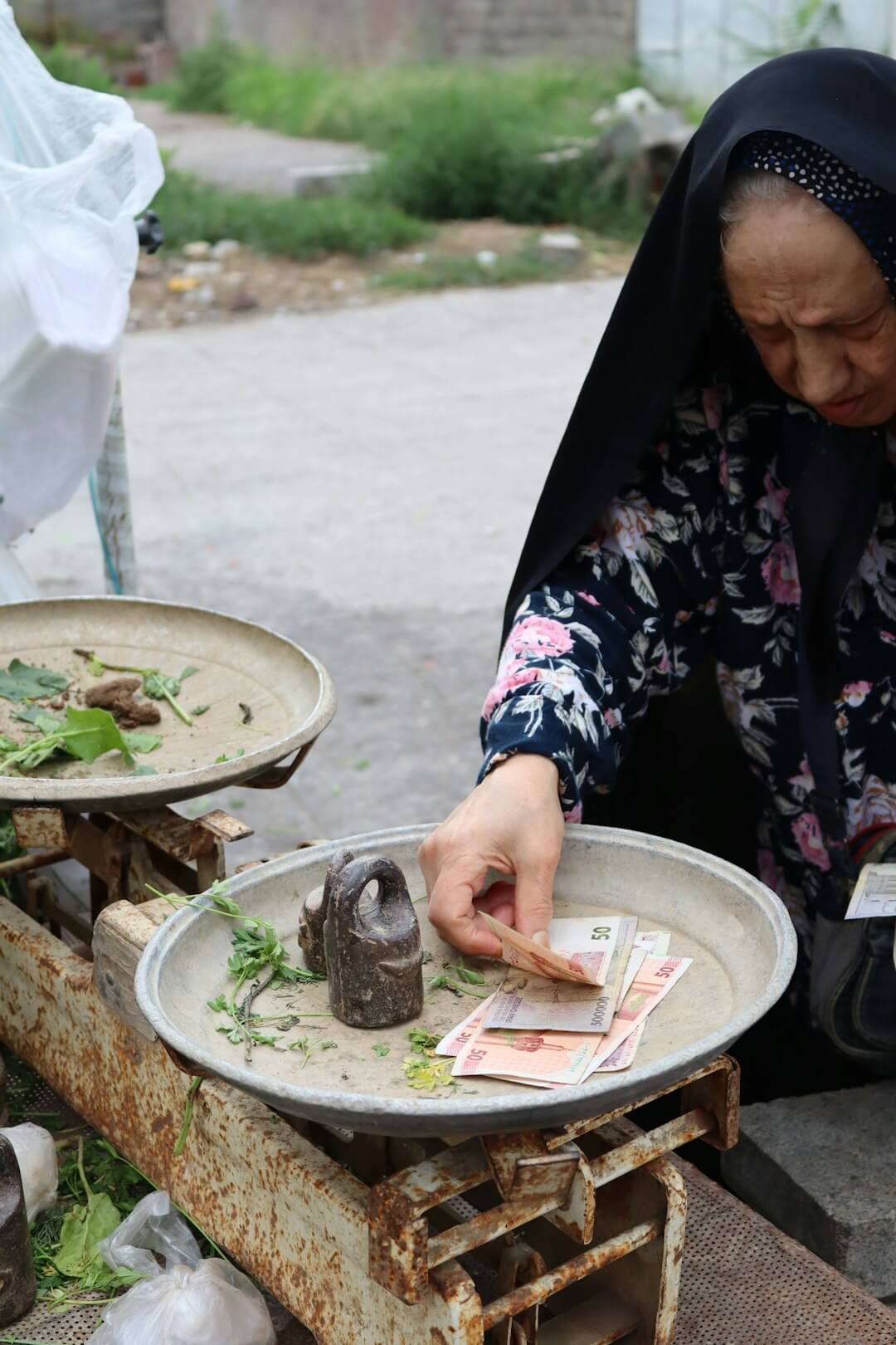 person pouring chocolate on food