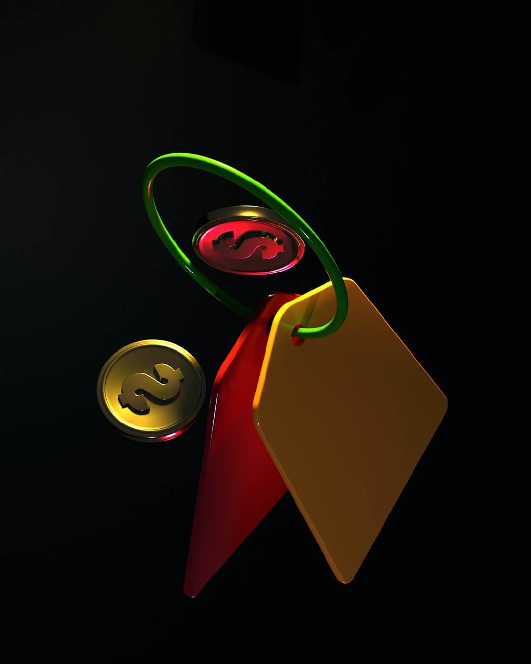 Two dollar coins and two colorful tags hanging from a green ring