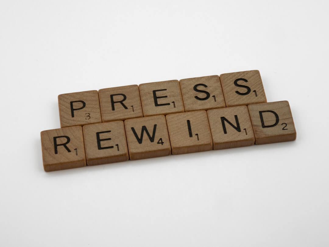 the word press stop spelled with wooden blocks