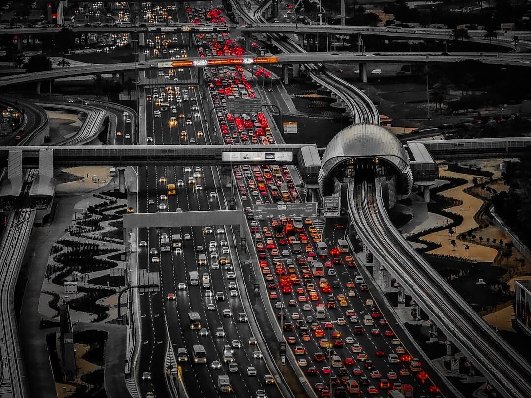 black car side mirror with water droplets