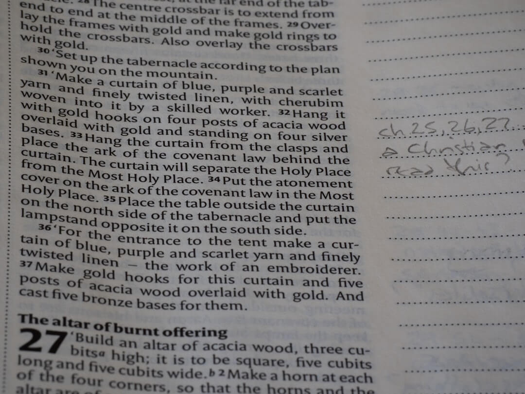 a close up of an open book with text