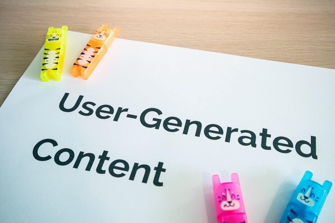 a spiral notebook with the words user - generated content on it